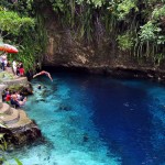 TRULY ENCHANTED. Local tourists enjoy swimming in the blue waters of the Enchanted River in Hinatuan town in Surigao del Sur on June 22, 2012.  MindaNews photo by Erwin Mascarinas